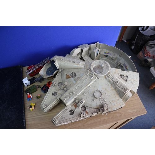 73 - Aged Millennium Falcon and Cars