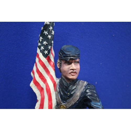 49 - American Soldier Figurine, Little chip to flagpole, 27cm