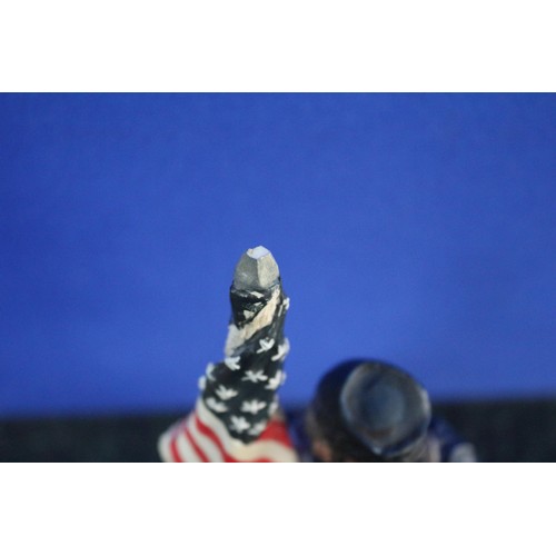 49 - American Soldier Figurine, Little chip to flagpole, 27cm