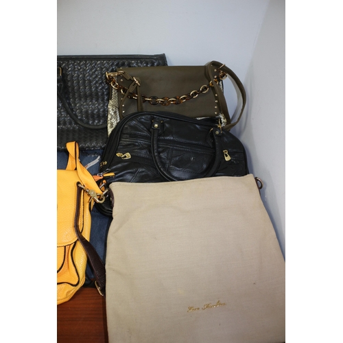 331 - 8 Ladies Handbags