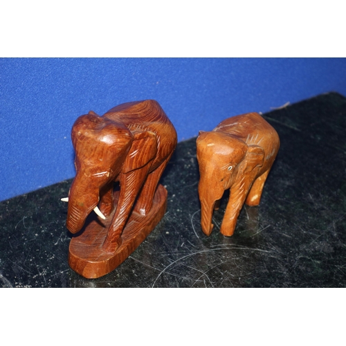 64 - 2 x Hand Carved Wooden Elephants