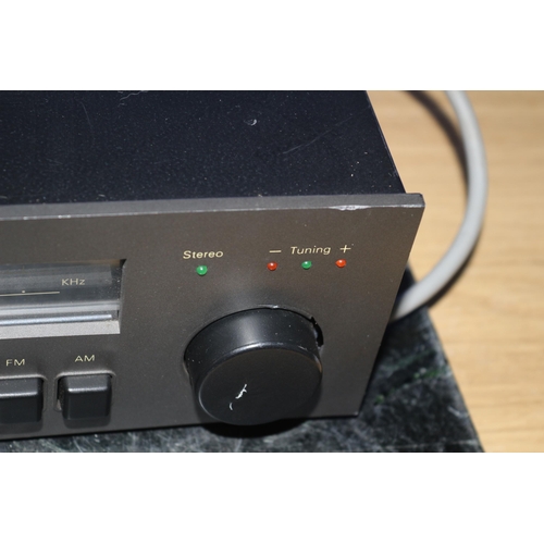 69 - NAD AM/FM Stereo Tuner 4020A