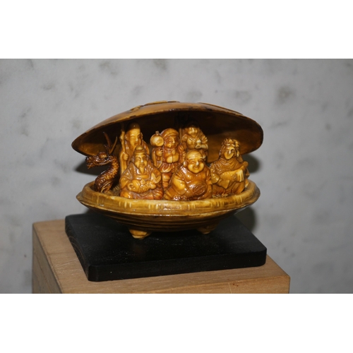 22 - Chinese Boxed Carved Clam Shell with Dragon Boat Carrying Buddha and Various Deities