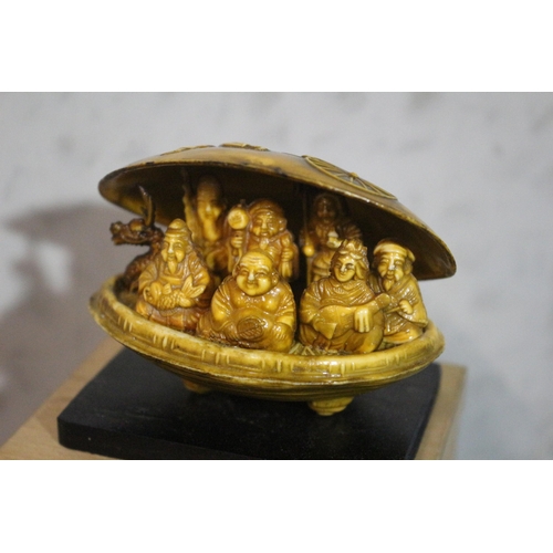 22 - Chinese Boxed Carved Clam Shell with Dragon Boat Carrying Buddha and Various Deities