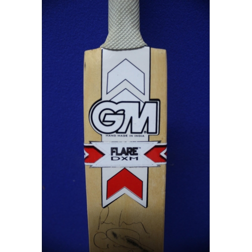 145 - Miniature Multi Signed Cricket Bat