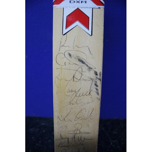 145 - Miniature Multi Signed Cricket Bat