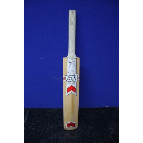 145 - Miniature Multi Signed Cricket Bat