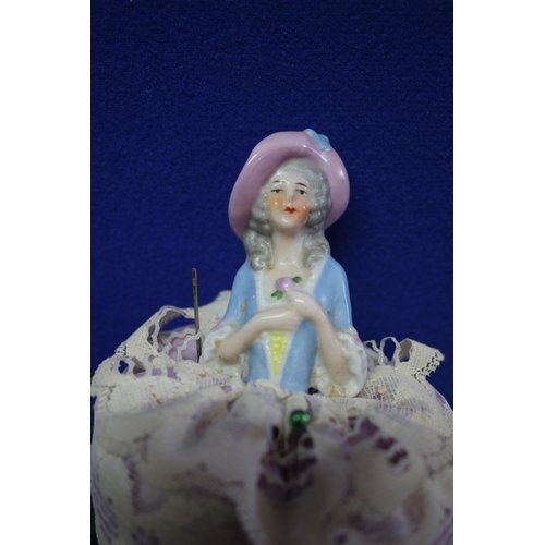 213 - Aged Porcelain Pin Doll with Cushion - 14.5cm