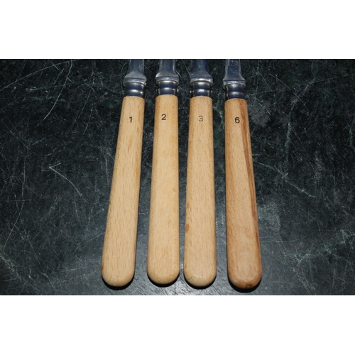 257 - 4 x Le Creuset Wooden Handled Forks