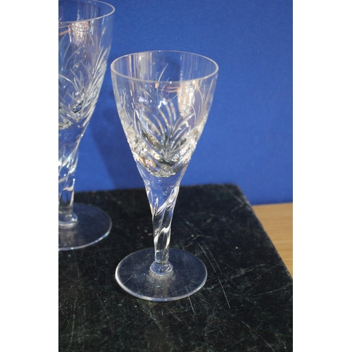 288 - Set of 4 Twisted Stem Crystal Glasses plus Other Design Crystal Glasses