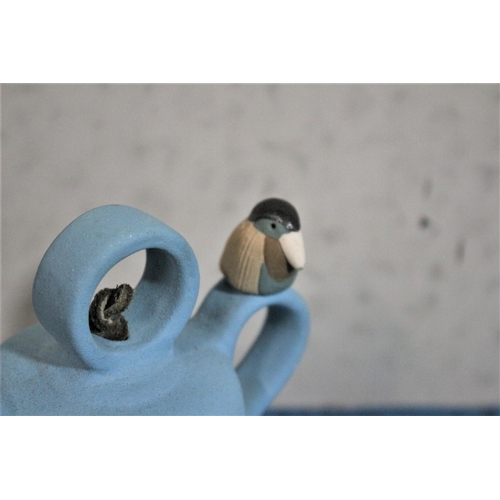 333 - Blue Pottery Bell with Nesting Birds