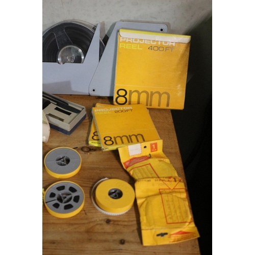 103 - Vintage Eumic P8 Automatic Projector plus Various Reels and Accessories and Manual