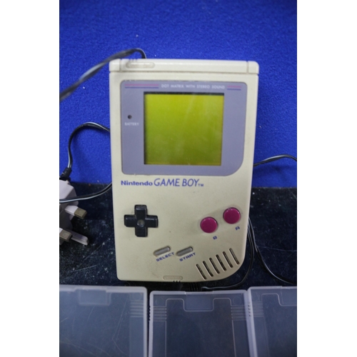 116 - Vintage Game Boy with Power Lead and 4 Games in Plastic Wallets - Believed to be Working