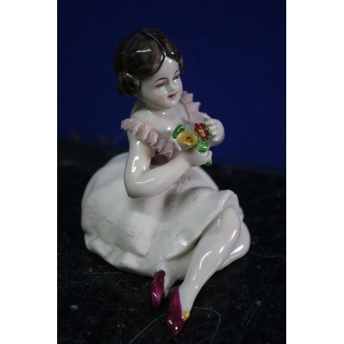 137 - Dresden Porcelain Figure of a Young Girl with a Posy of Flowers - 7.5cm