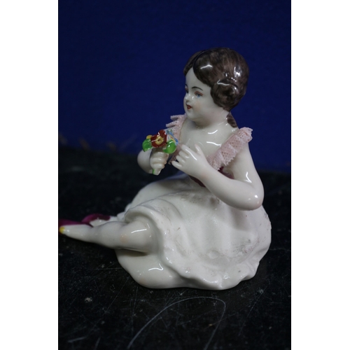 137 - Dresden Porcelain Figure of a Young Girl with a Posy of Flowers - 7.5cm