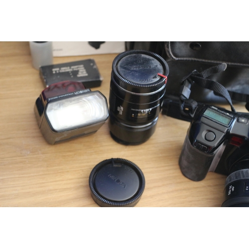 156 - Quality Minolta Dynax 7000i SLR Camera with Lenses, Flash, Filters and Bag with Manual and Other Ite... 