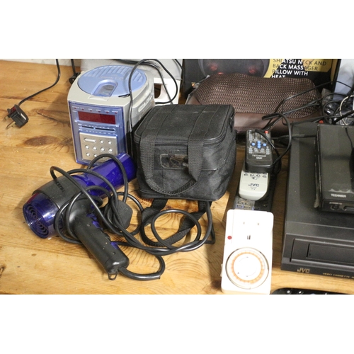 180 - Quantity of Electrical Items including Technika DVD Player, JVC VHS Player, Massager, Steam Cleaner,... 