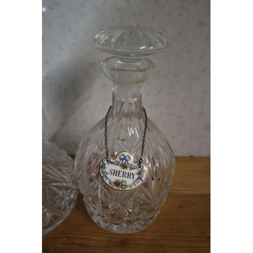 188 - 2 Glass Decanters including a Ships Decanter and a Sherry Decanter - The Sherry Decanter Has a Coalp... 