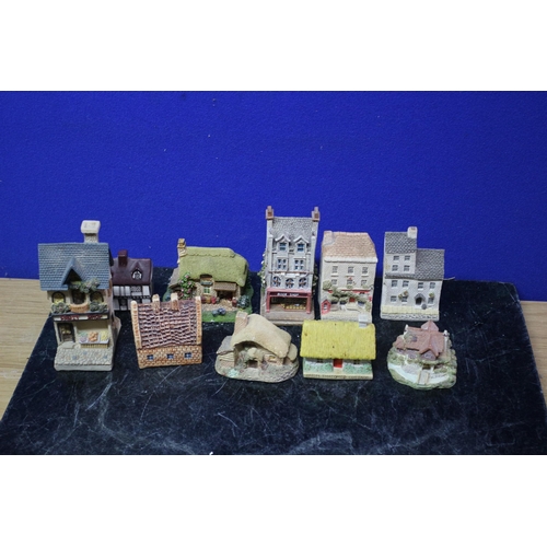 219 - 10 x Miniature Cottages / Buildings