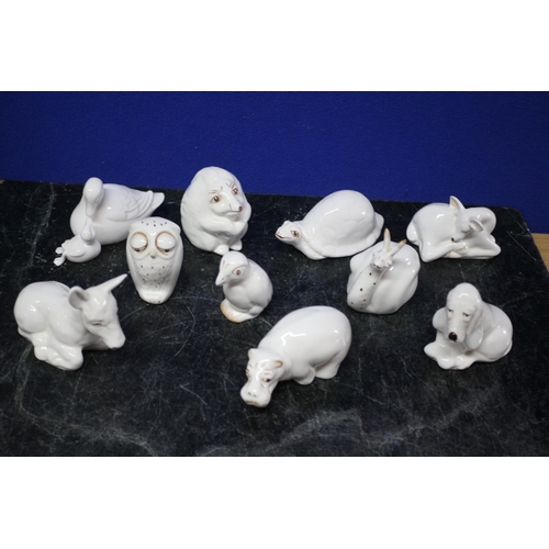 68 - 10 x Coalport White Animals