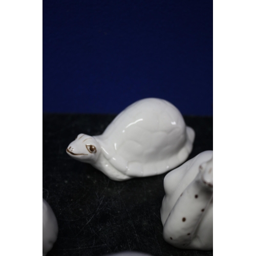 68 - 10 x Coalport White Animals