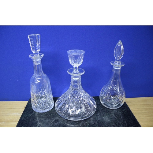 14 - 3 Glass Decanters - We are informed that two are by Waterford- Tallest is 34cm