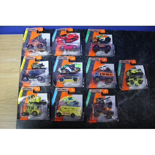 21 - 10 x Matchbox Card Backed Vehicles including MBX Construction, Adventure City and Explorer