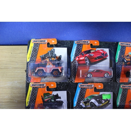 21 - 10 x Matchbox Card Backed Vehicles including MBX Construction, Adventure City and Explorer