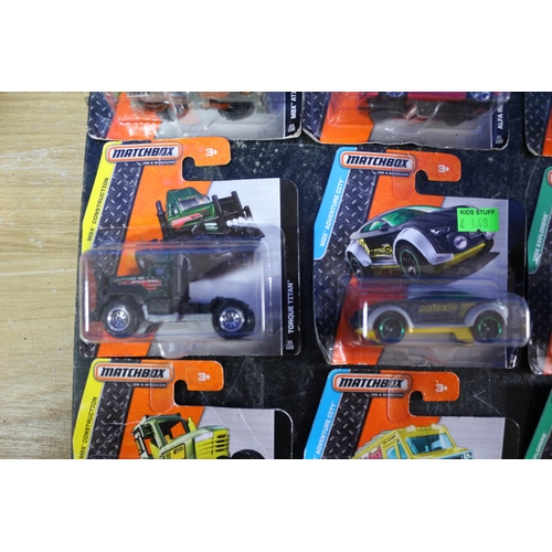 21 - 10 x Matchbox Card Backed Vehicles including MBX Construction, Adventure City and Explorer