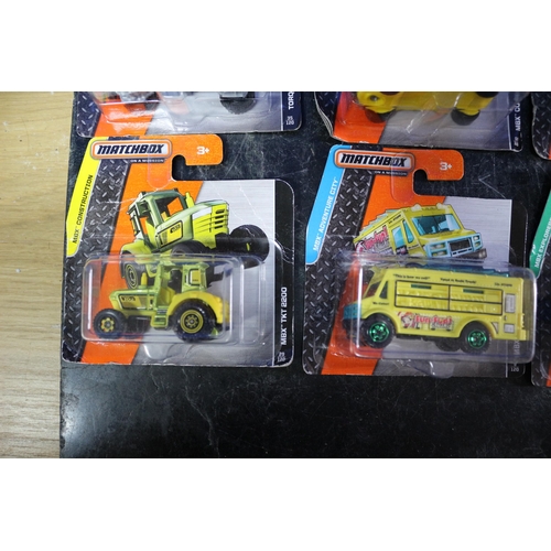 21 - 10 x Matchbox Card Backed Vehicles including MBX Construction, Adventure City and Explorer