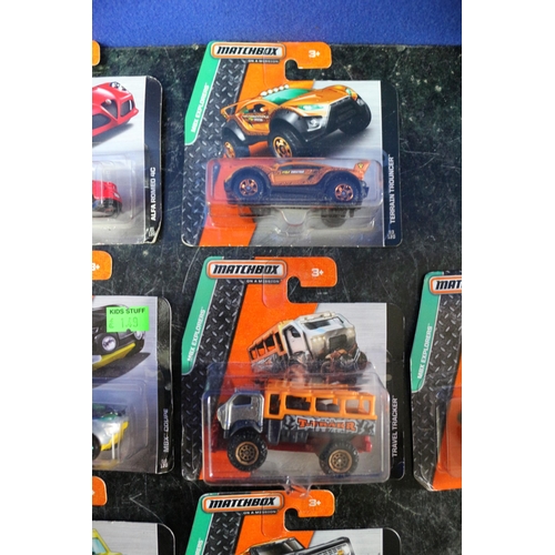 21 - 10 x Matchbox Card Backed Vehicles including MBX Construction, Adventure City and Explorer