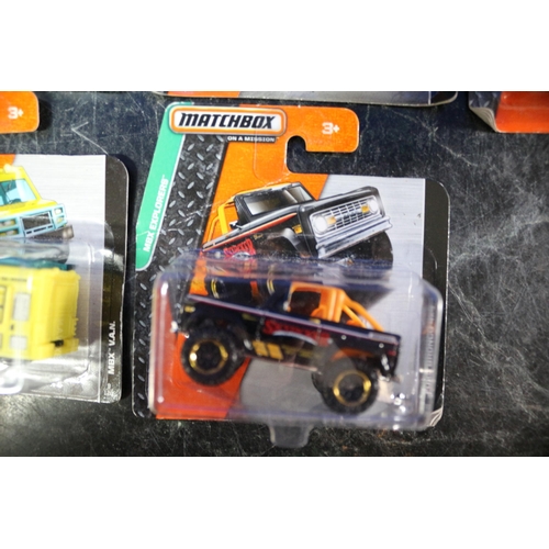 21 - 10 x Matchbox Card Backed Vehicles including MBX Construction, Adventure City and Explorer