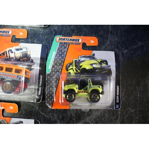 21 - 10 x Matchbox Card Backed Vehicles including MBX Construction, Adventure City and Explorer