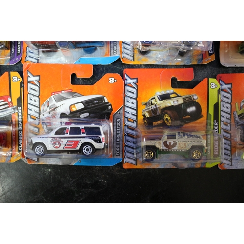 23 - 18 x Matchbox Mixed Series Card Backed Vehicles