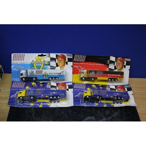 47 - 4 x Michael Schumacher Lorries in Card Backed Packaging