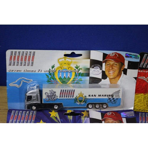 47 - 4 x Michael Schumacher Lorries in Card Backed Packaging