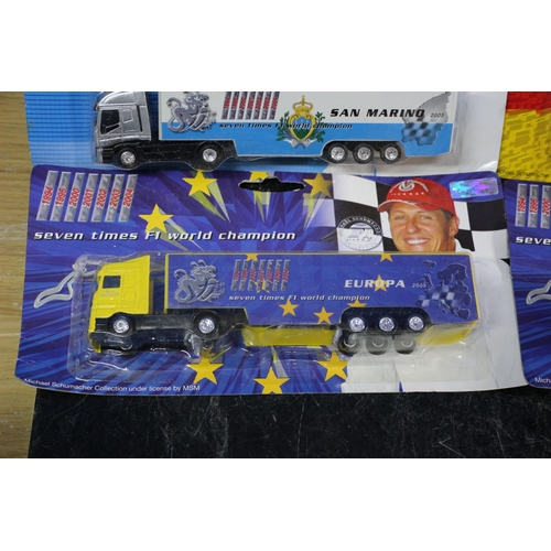 47 - 4 x Michael Schumacher Lorries in Card Backed Packaging