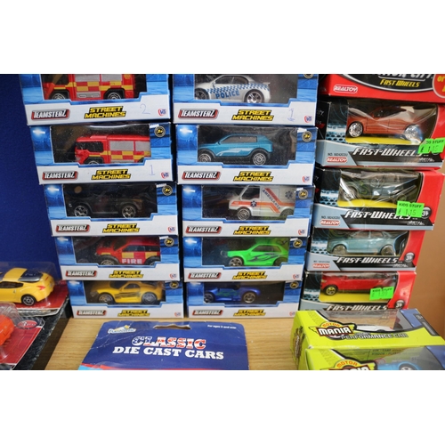 49 - Large Selection of over 75 Boxed Die Cast Model Vehicles