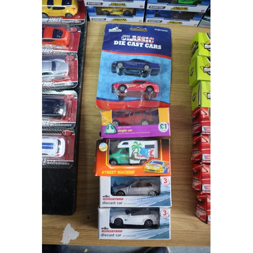 49 - Large Selection of over 75 Boxed Die Cast Model Vehicles