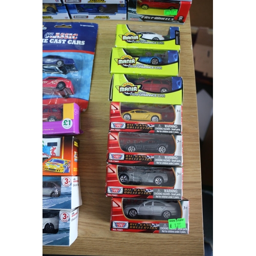 49 - Large Selection of over 75 Boxed Die Cast Model Vehicles