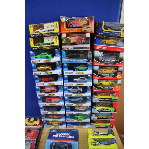 49 - Large Selection of over 75 Boxed Die Cast Model Vehicles