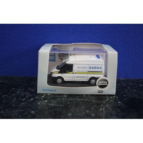 59 - Oxford Die Cast Garda Transit Van in Box with Outer Packaging