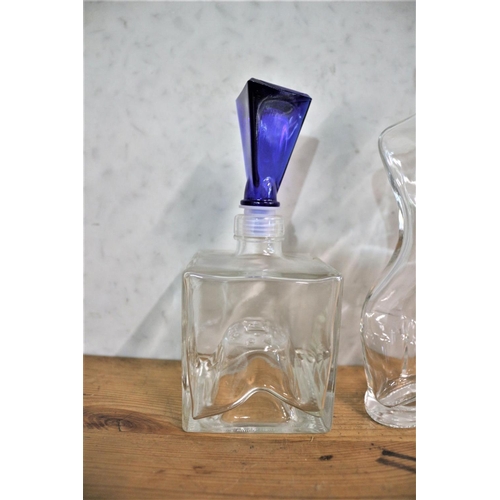 110 - 2 x Decanter Bottles with Blue Glass Tops