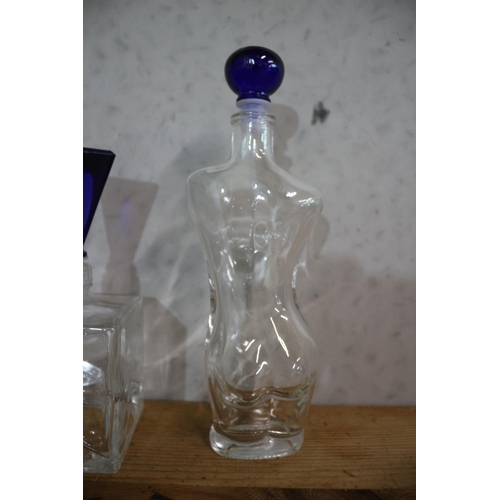 110 - 2 x Decanter Bottles with Blue Glass Tops