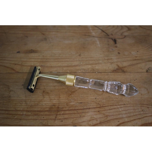 115 - Glass Handled Brass? Razor