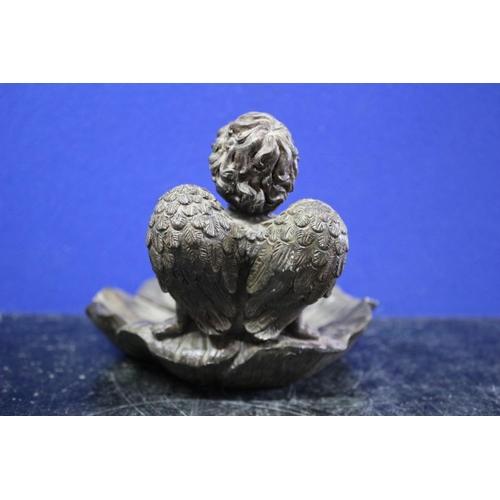 160 - Nice Cherub Sitting on a Flower Resin Figure