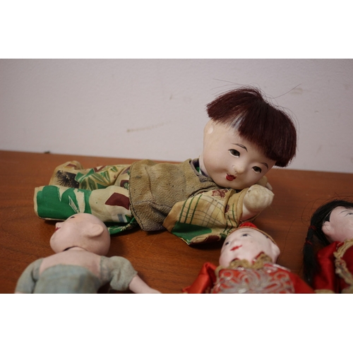 354 - Nice Selection of Oriental Hand Dolls