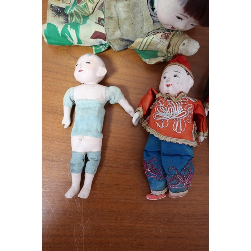 354 - Nice Selection of Oriental Hand Dolls