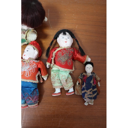 354 - Nice Selection of Oriental Hand Dolls