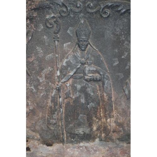 394 - English Antique Cast Iron Fireback Featuring a Rare Catholic Figure to the Centre with Iron Mongers ... 